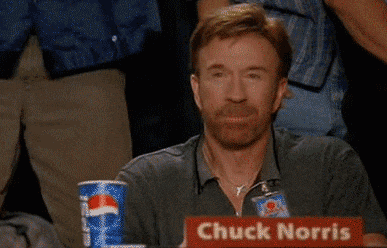 Gif ator Chuck Norris fazendo sinal de joinha. 