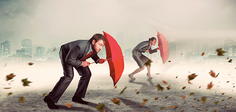 Imagem pessoas enfrentando vento forte com guarda chuva. vendas de serviços de TI em tempos de crise.